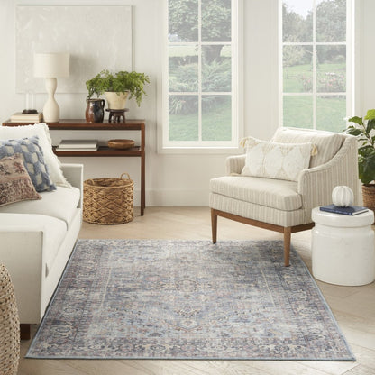 4' X 6' Light Grey And Blue Oriental Power Loom Distressed Washable Area Rug