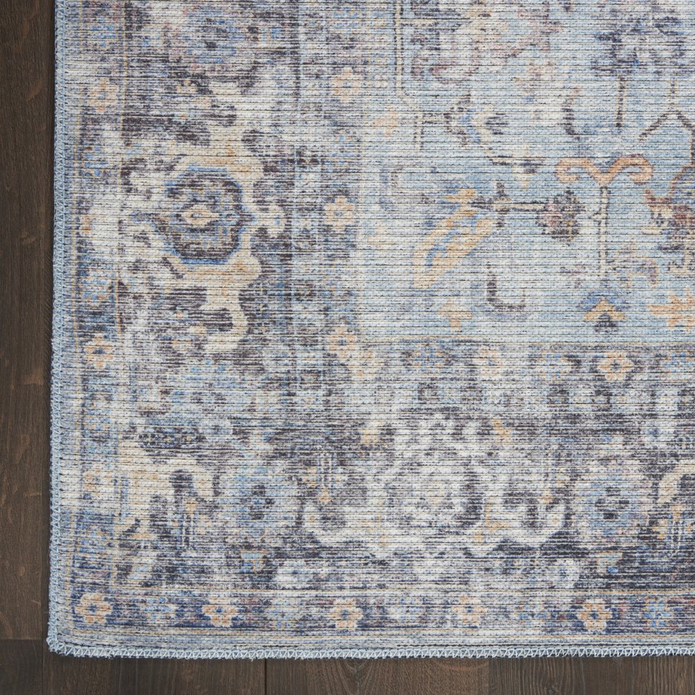 5' X 7' Light Grey And Blue Oriental Power Loom Distressed Washable Area Rug