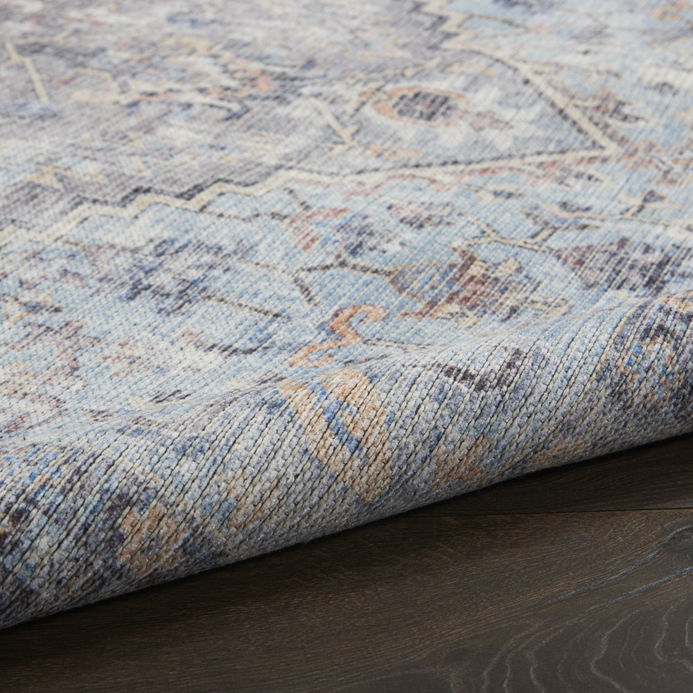 5' X 7' Light Grey And Blue Oriental Power Loom Distressed Washable Area Rug