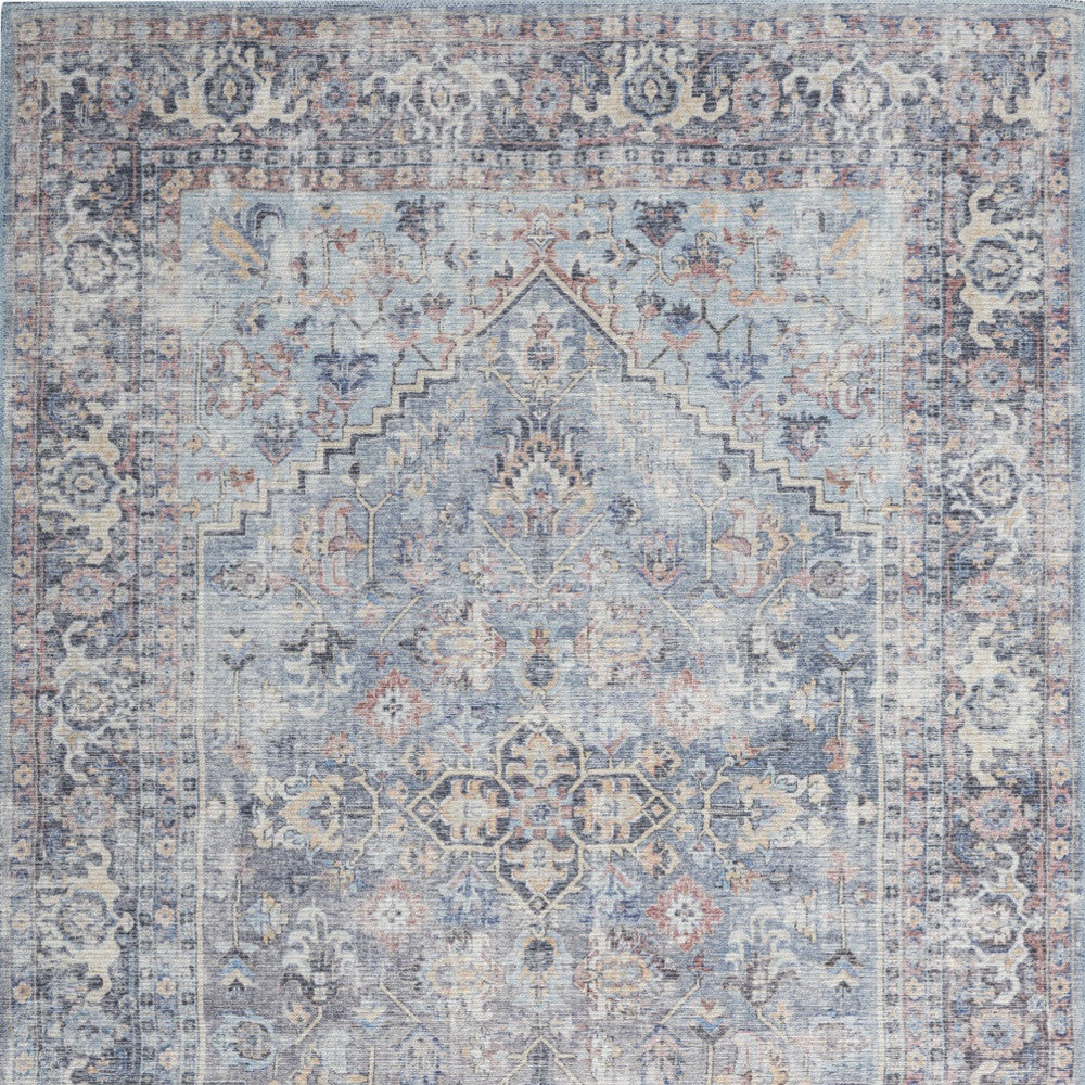 5' X 7' Light Grey And Blue Oriental Power Loom Distressed Washable Area Rug