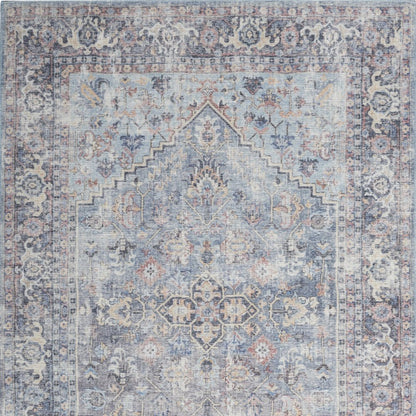 5' X 7' Light Grey And Blue Oriental Power Loom Distressed Washable Area Rug