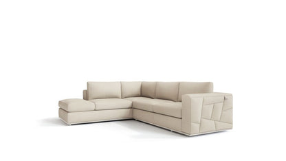 Beige fabric L-shaped sectional sofa with left chaise and low back cushions; geometric stitched arm panels.