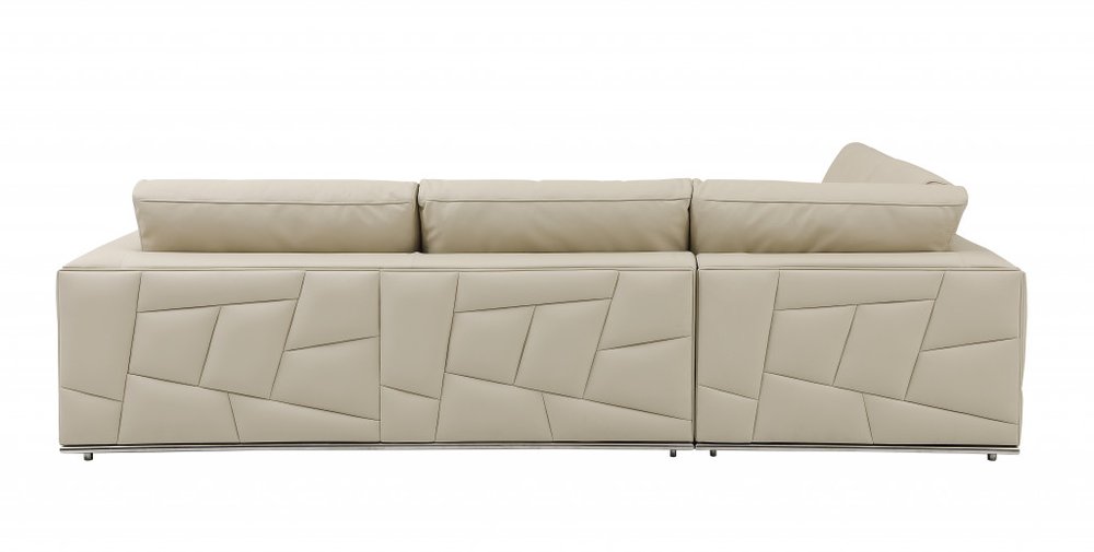 Beige Italian leather reclining L-shaped two-piece corner sectional.