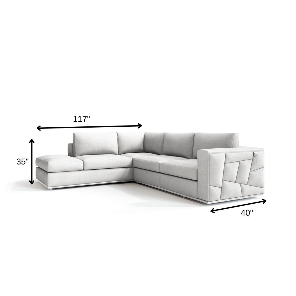 White Italian leather reclining L-shaped two-piece corner sectional.