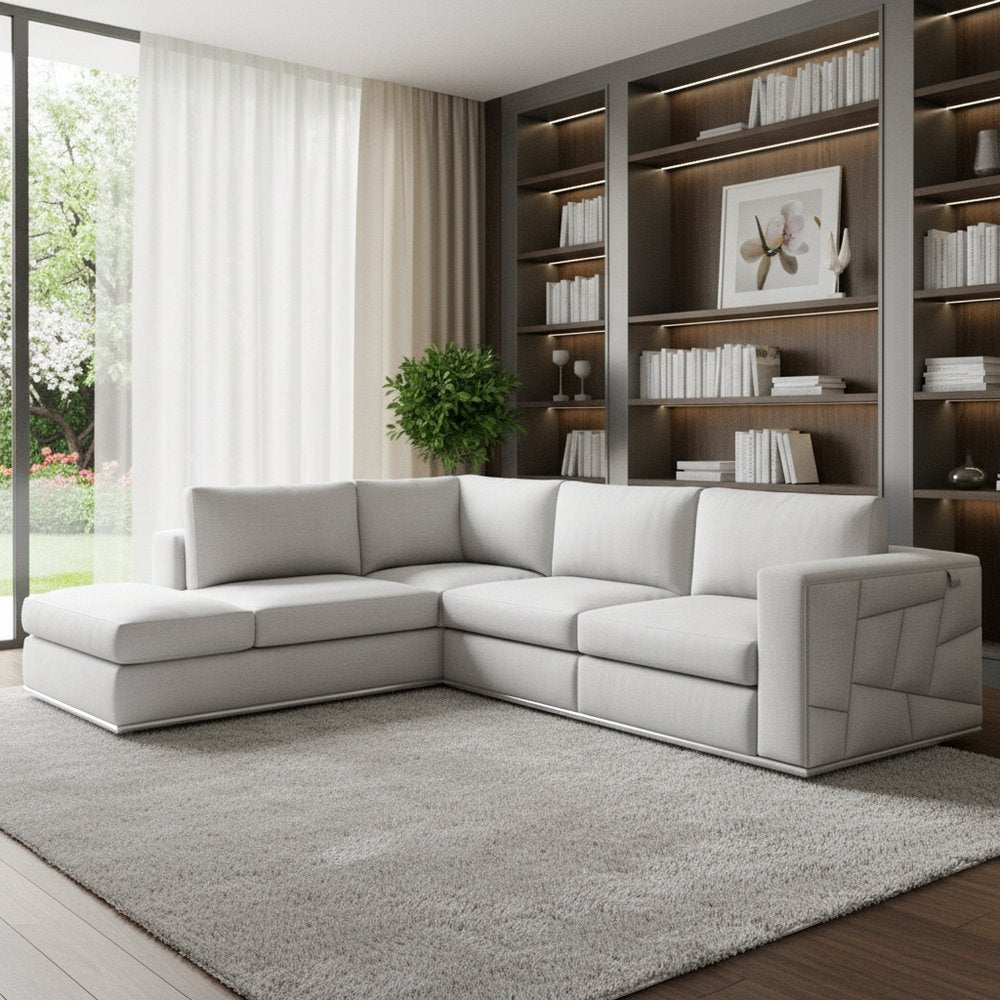 White Italian leather reclining L-shaped two-piece corner sectional sofa.