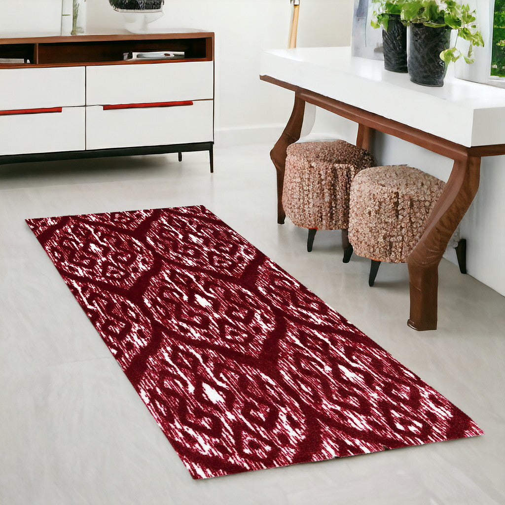 2' X 6' Red And White Ikat Tufted Washable Non Skid Area Rug