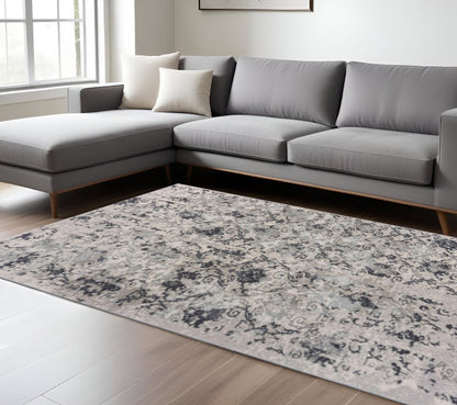 10' X 13' Cream And Gray Damask Stain Resistant Area Rug