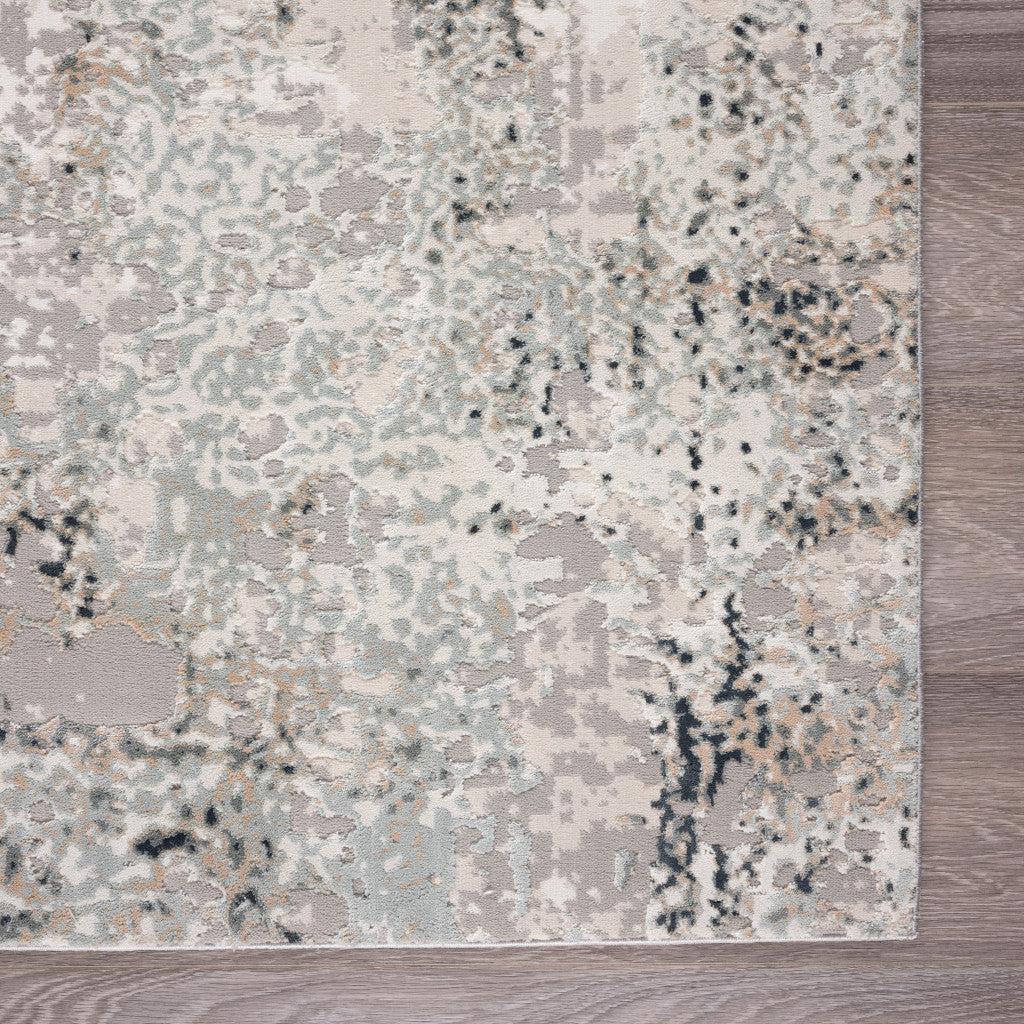 2' X 3' Gray Cream And Taupe Abstract Distressed Stain Resistant Area Rug