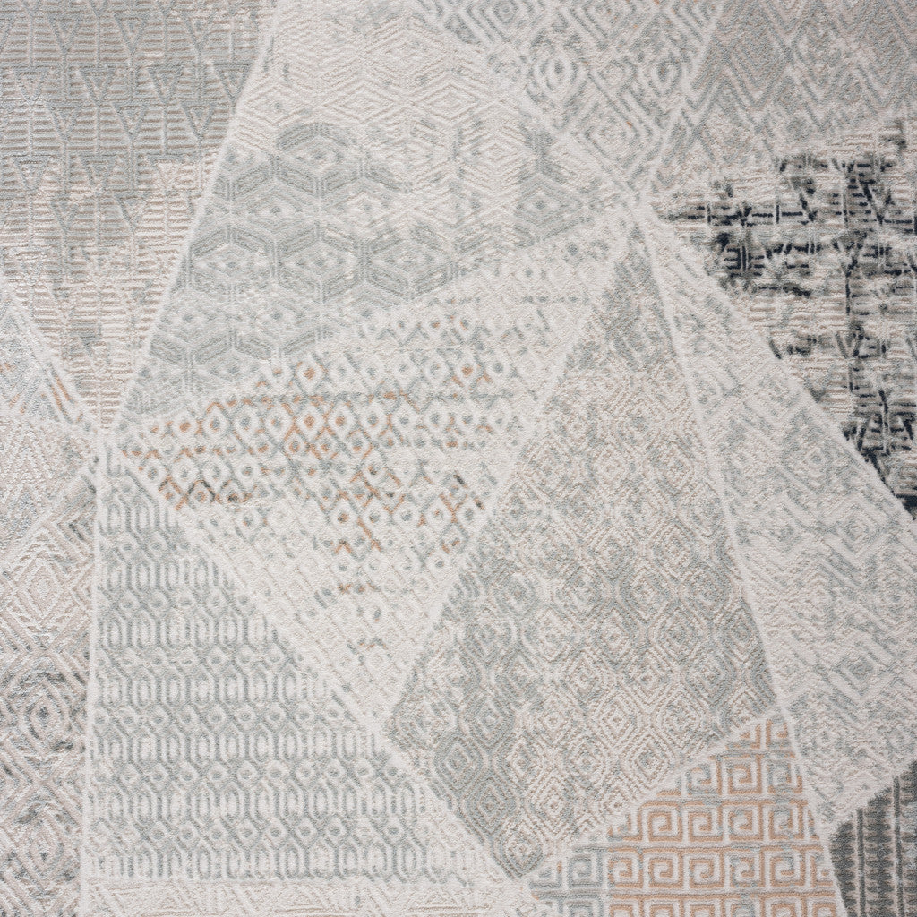 9 X 12' Gray Blue Taupe And Cream Geometric Distressed Stain Resistant Area Rug