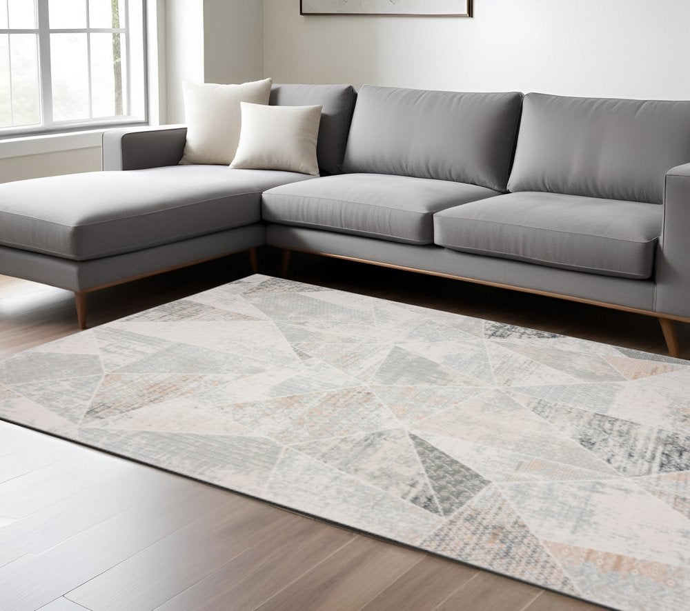 9' X 12' Gray Blue Taupe And Cream Geometric Distressed Stain Resistant Area Rug