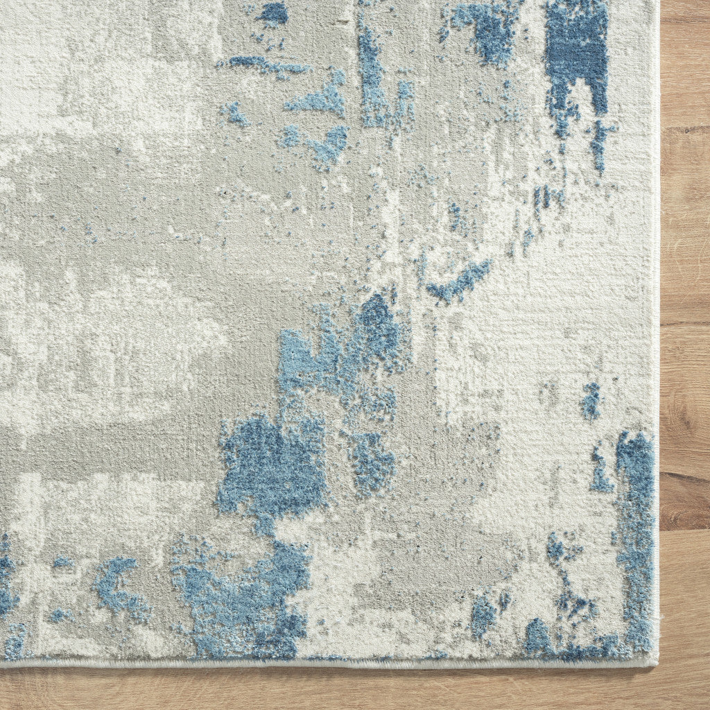 2' X 3' Ivory Gray And Blue Abstract Stain Resistant Area Rug