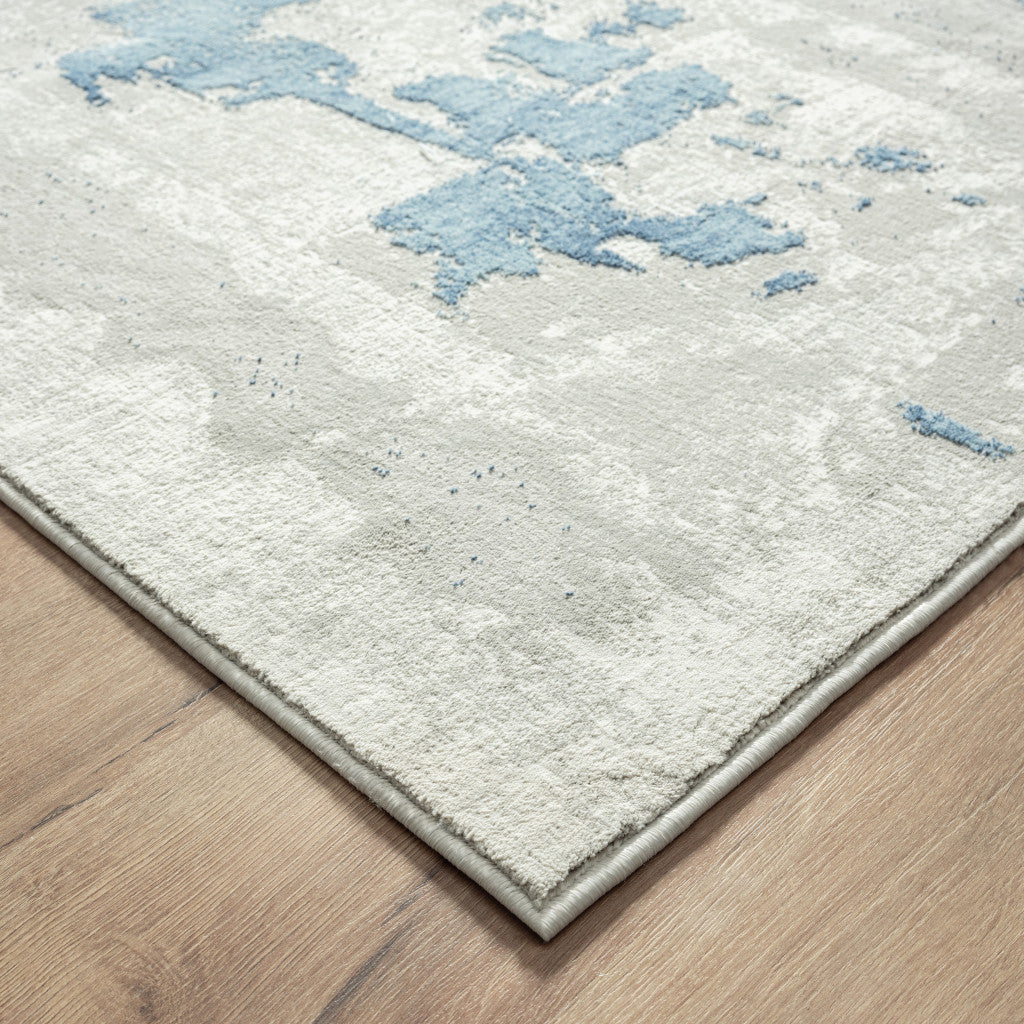 8' X 10' Ivory Gray And Blue Abstract Power Loom Stain Resistant Area Rug