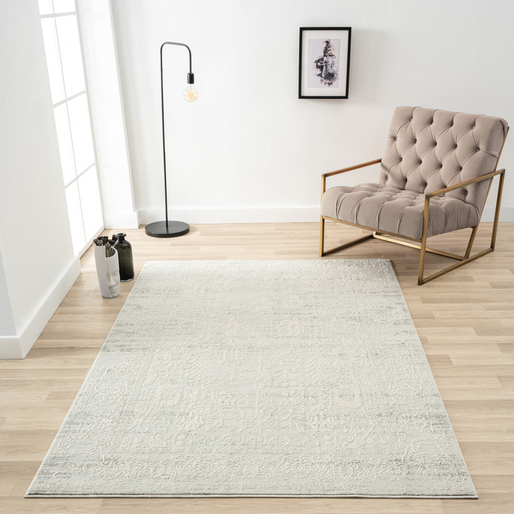 2' X 6' Ivory And Gray Floral Stain Resistant Area Rug