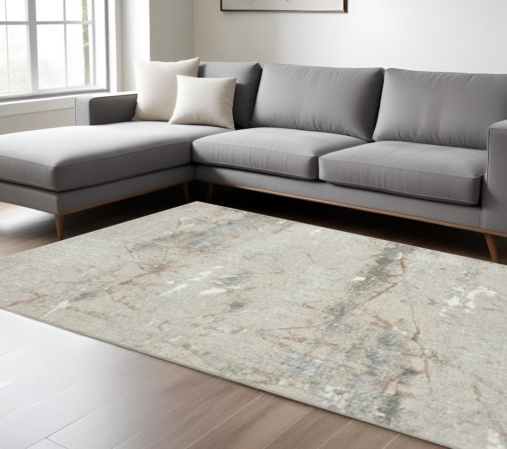 7' X 9' Beige Gray And Brown Abstract Area Rug
