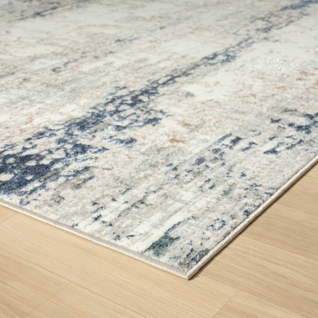 5' X 7' Beige Cream Blue And Gray Abstract Stain Resistant Area Rug