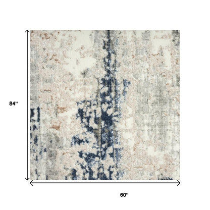 5' X 7' Beige Cream Blue And Gray Abstract Stain Resistant Area Rug