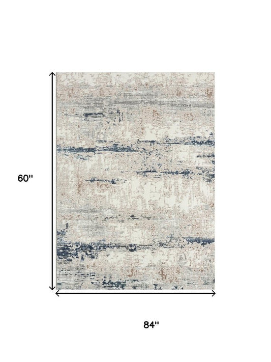 5' X 7' Beige Cream Blue And Gray Abstract Stain Resistant Area Rug