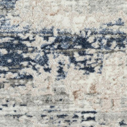 5' X 7' Beige Cream Blue And Gray Abstract Stain Resistant Area Rug