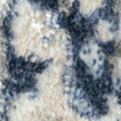7' X 9' Beige Cream Blue And Gray Abstract Stain Resistant Area Rug