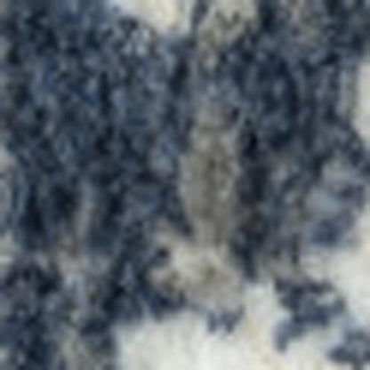 7' X 9' Beige Cream Blue And Gray Abstract Stain Resistant Area Rug