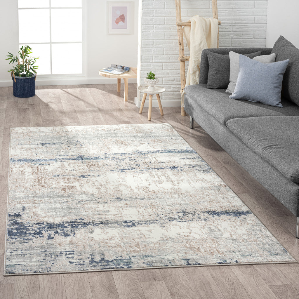 7' X 9' Beige Cream Blue And Gray Abstract Stain Resistant Area Rug