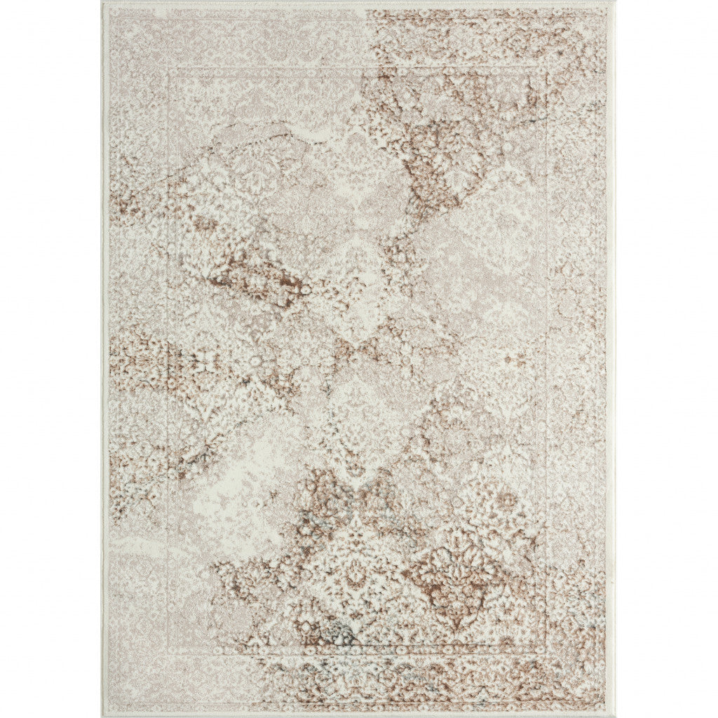 5' X 7' Beige Cream And Brown Damask Stain Resistant Area Rug