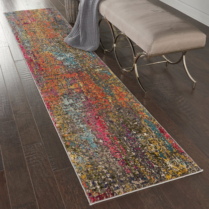 Long multicolor abstract-pattern rug runner on dark wood floor; contemporary, soft pile, versatile decor.