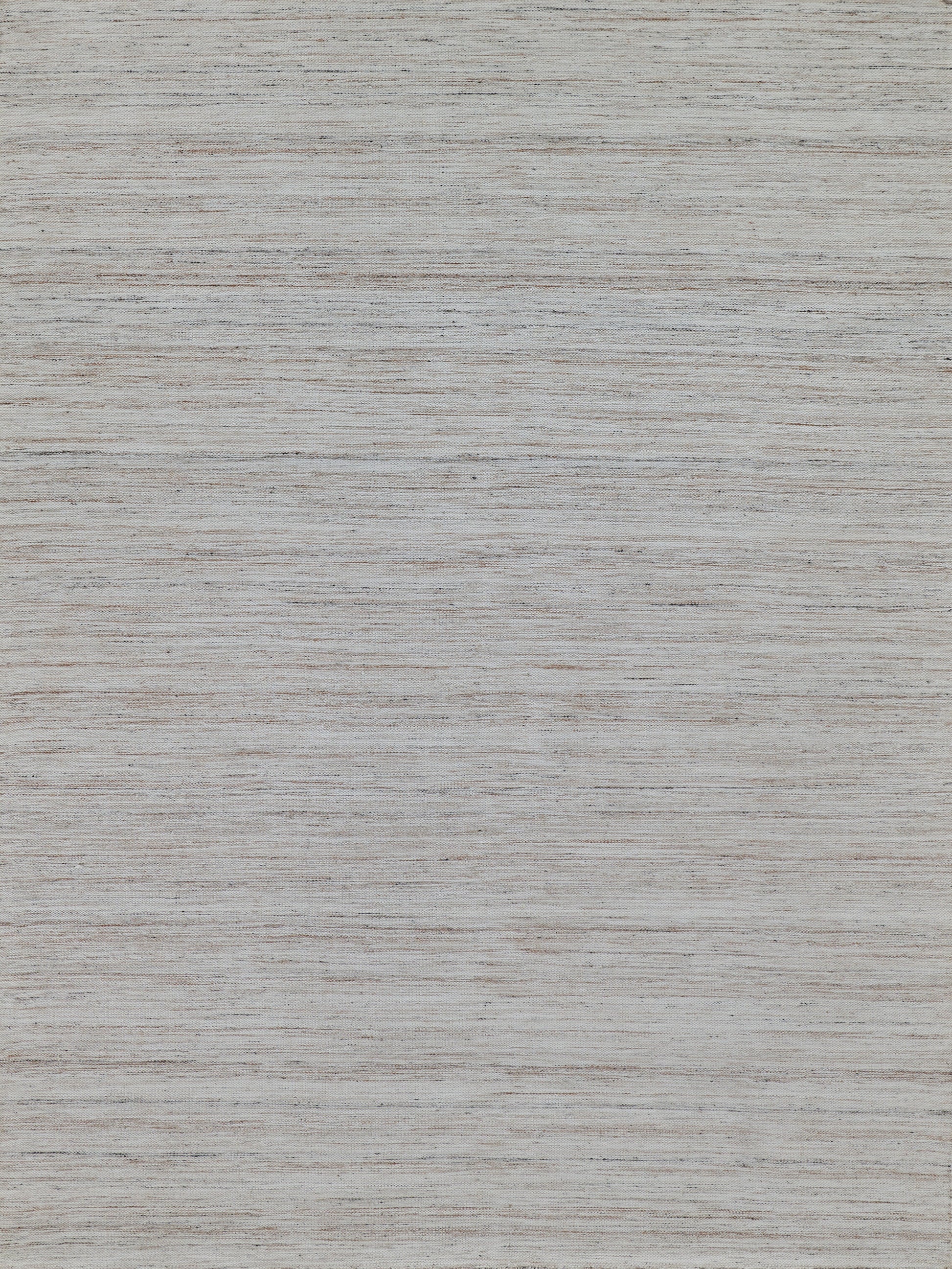 Light grey indoor/outdoor flat-weave rug with subtle texture.