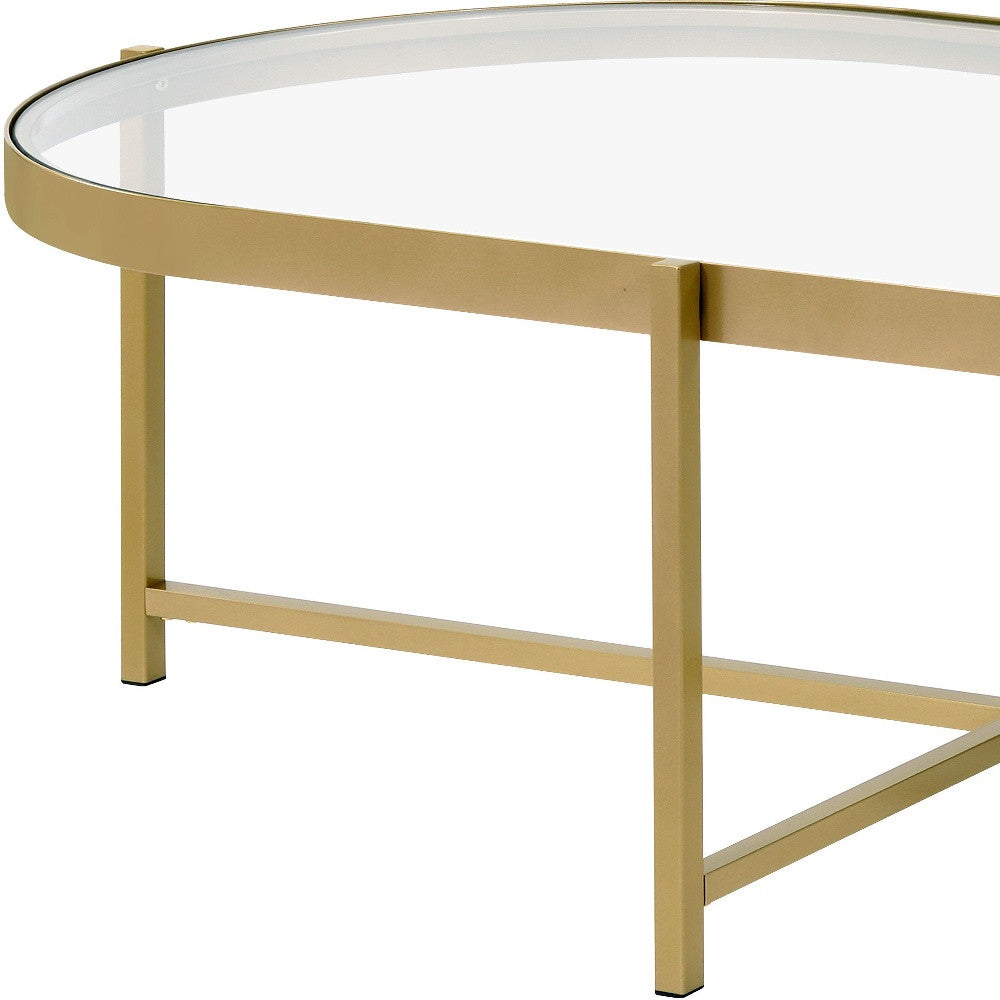 54" Gold And Clear Glass Oval Coffee Table