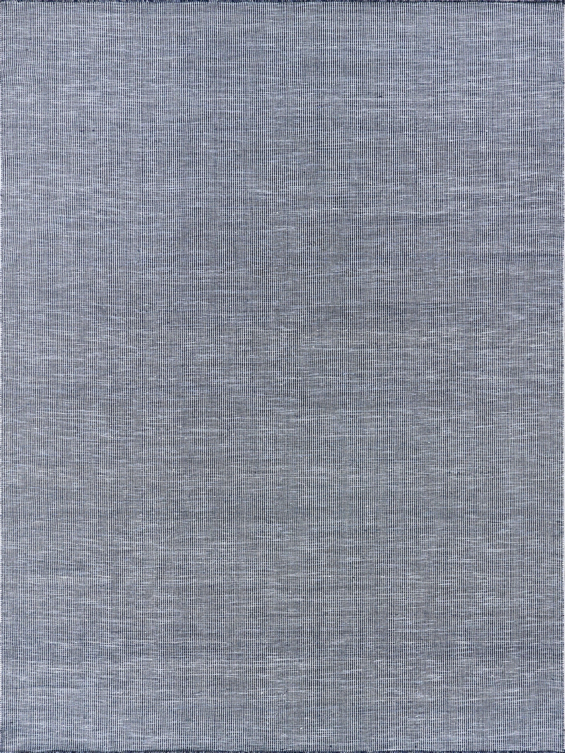 Blue-gray flat-weave rug with linen-like texture and fine horizontal weave.