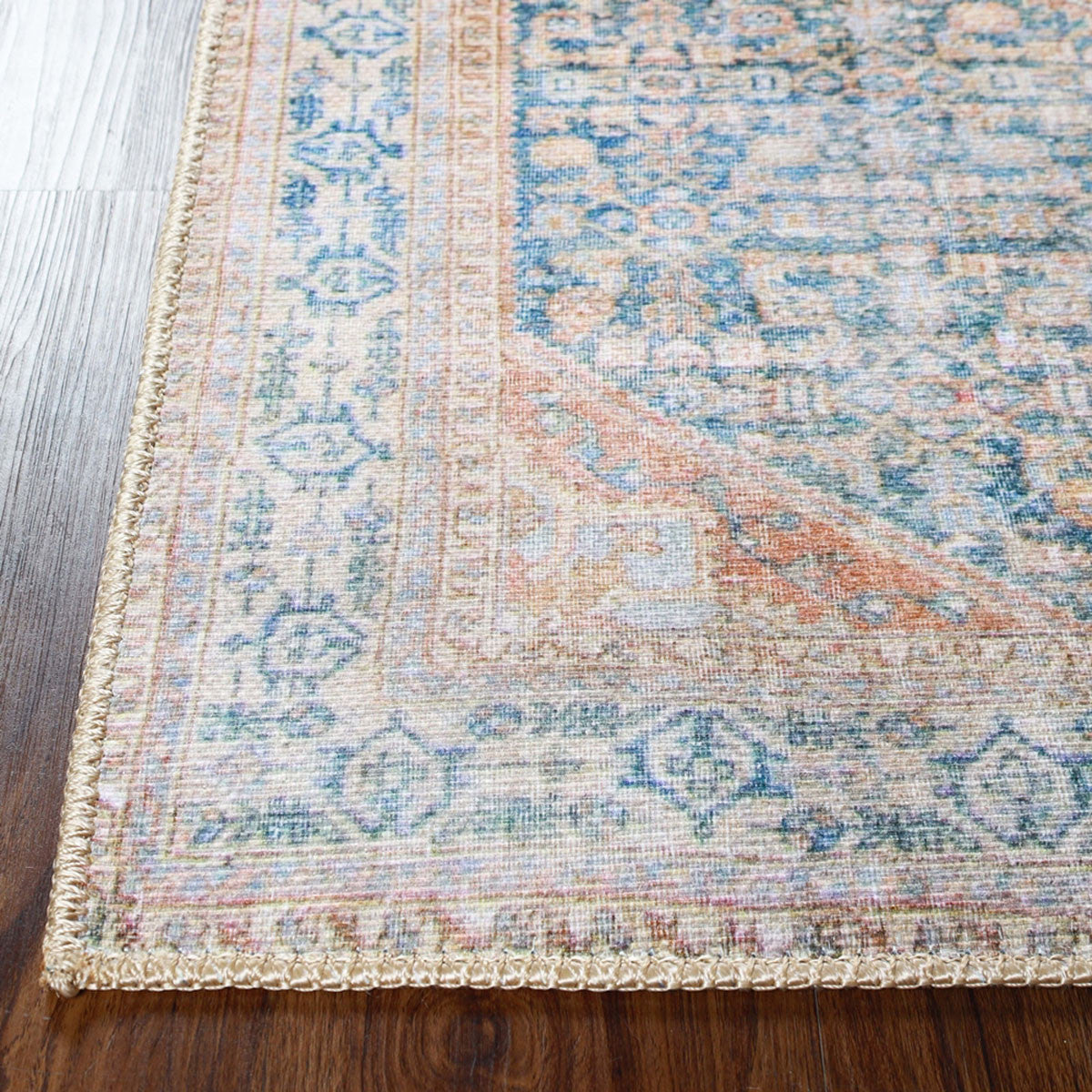 5' X 7' Latte and Blue Oriental Medallion Stain Resistant Area Rug