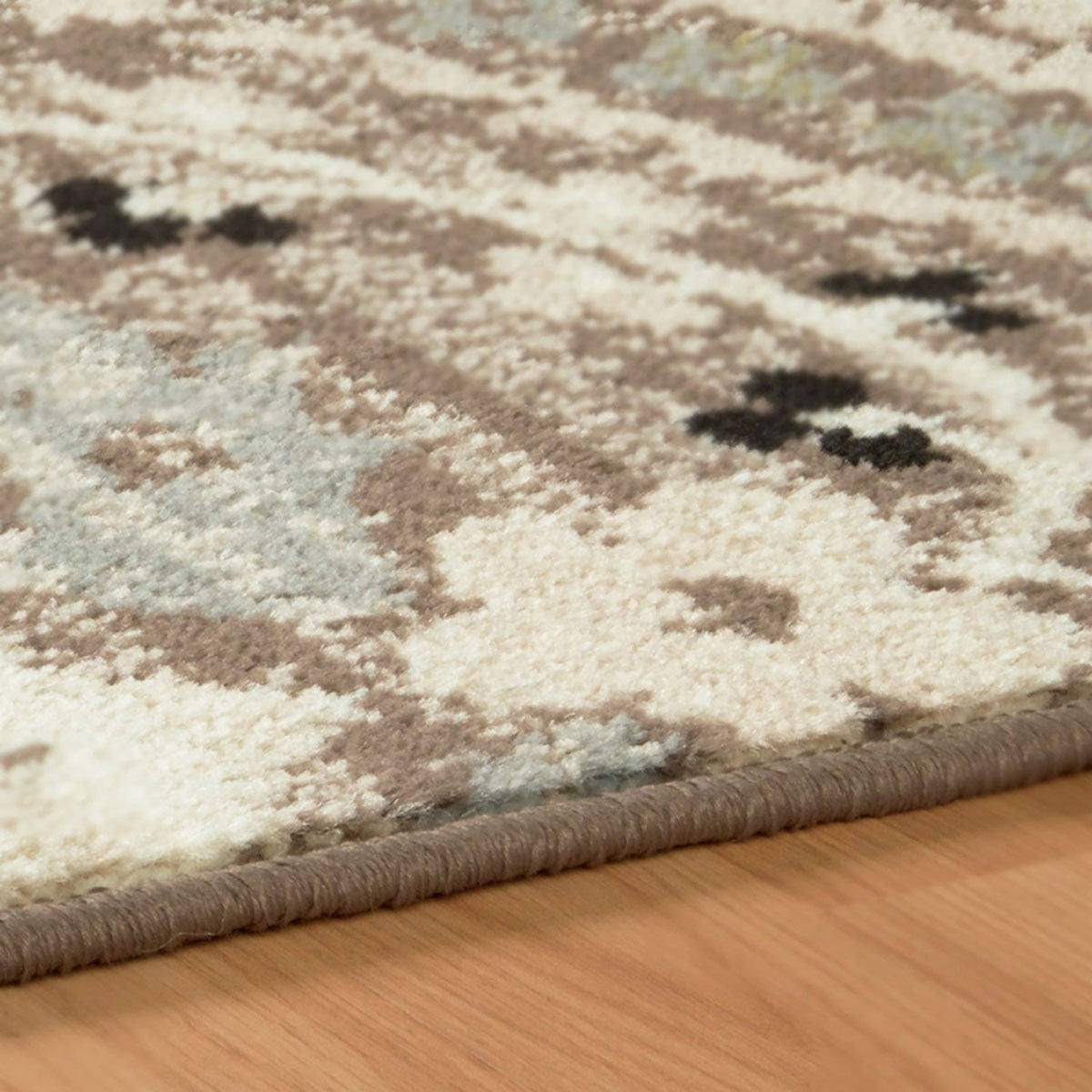 8' Ivory Beige And Light Blue Floral Stain Resistant Runner Rug