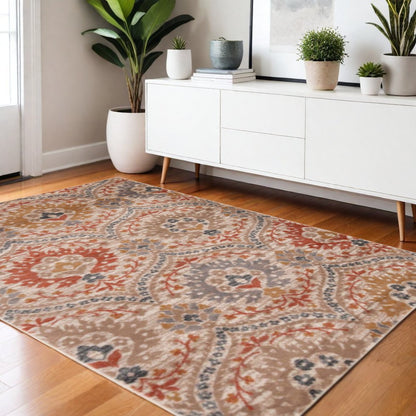 4' X 6' Orange And Ivory Floral Area Rug
