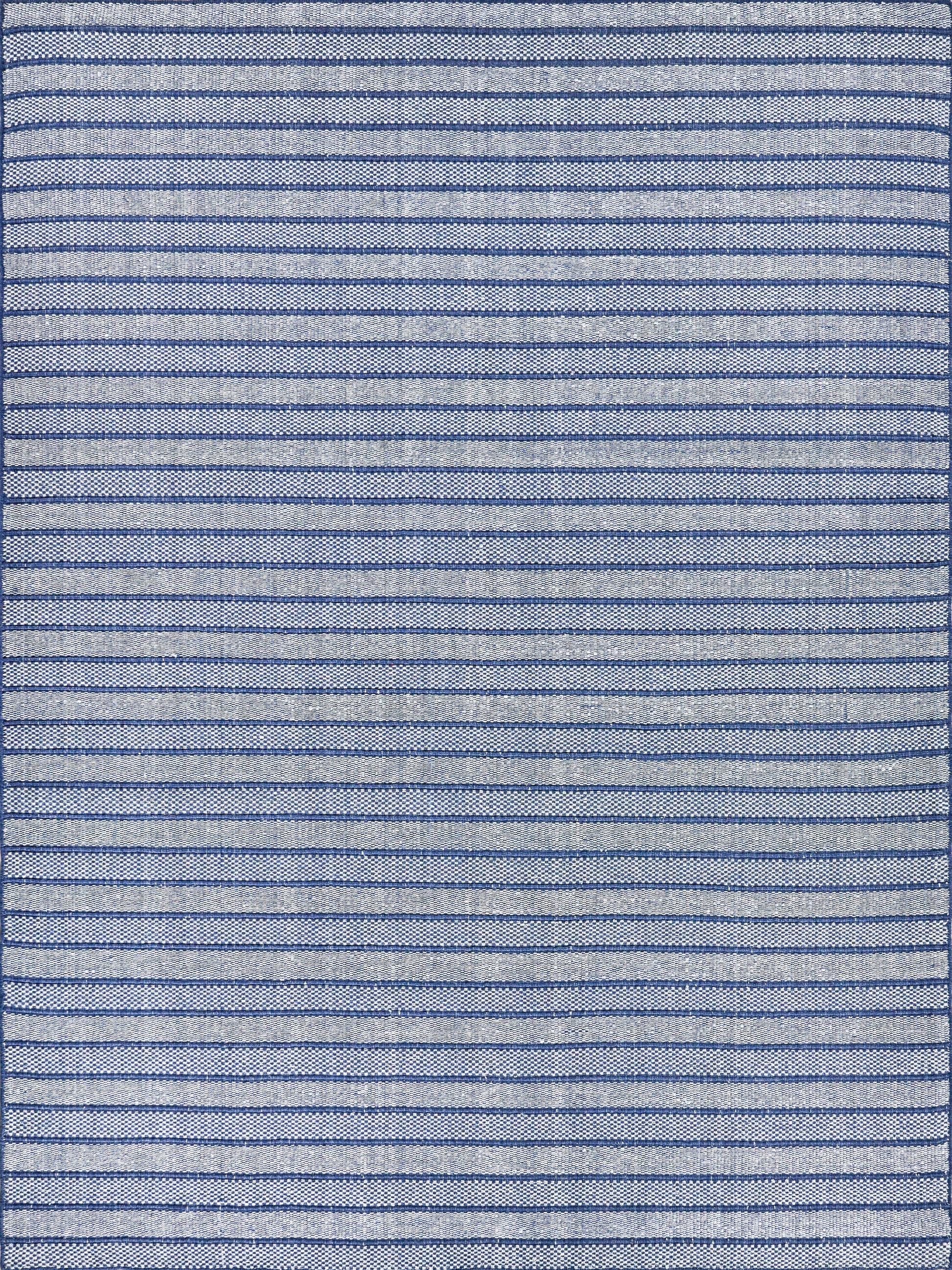 Light blue indoor/outdoor flat-weave rug with thin navy horizontal stripes.