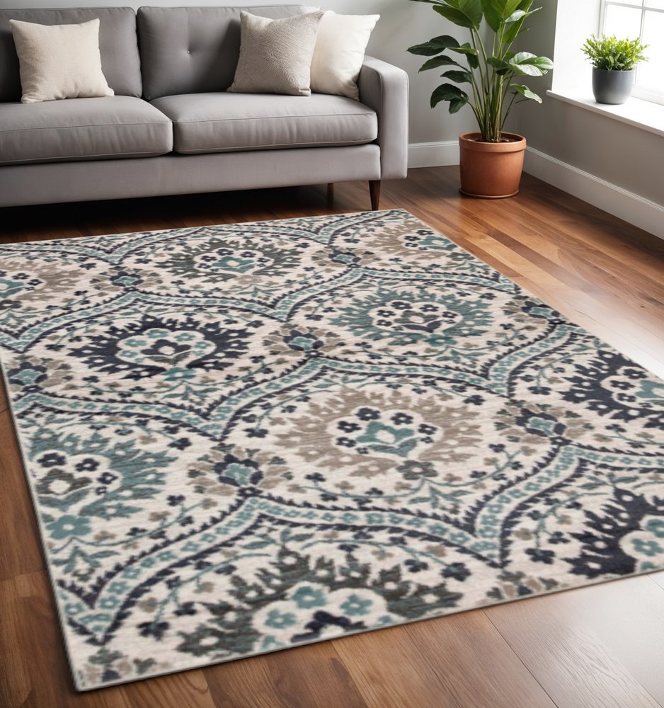 5' X 8' Ivory Blue And Gray Medallion Area Rug