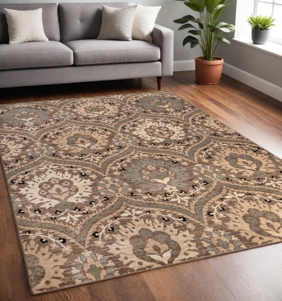 5' X 8' Ivory Beige And Light Blue Floral Stain Resistant Area Rug