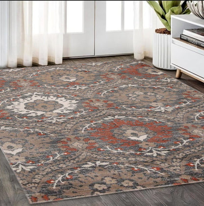 5' x 8' rust brown and gray floral area rug
