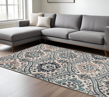 7' X 9' Ivory Blue And Gray Medallion Area Rug