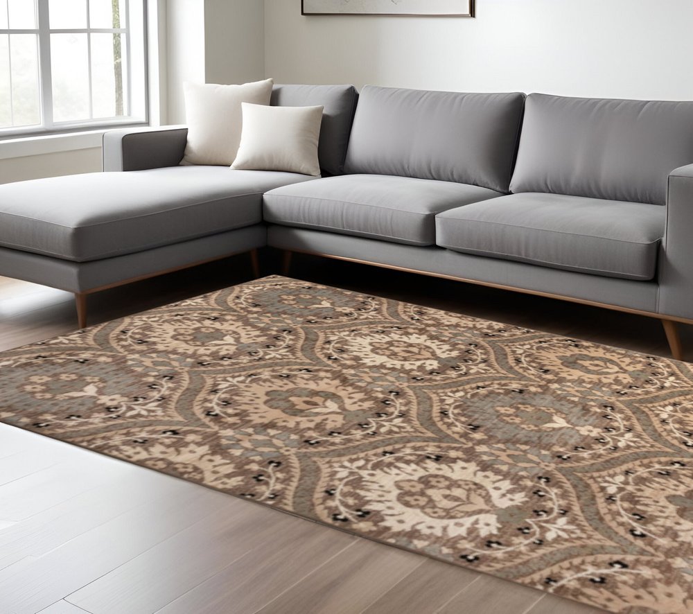 7' X 9' Beige And Ivory Floral Area Rug