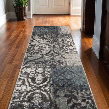 Teal and ivory damask distressed runner rug, 10' long.