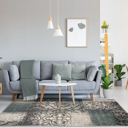 5' X 8' Teal And Ivory Damask Distressed Area Rug