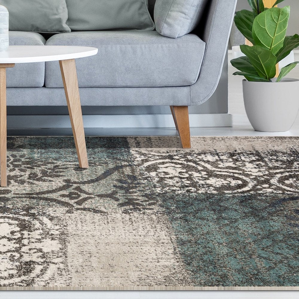 5' X 8' Teal And Ivory Damask Distressed Area Rug