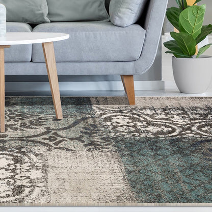 7' X 9' Teal And Ivory Damask Distressed Area Rug