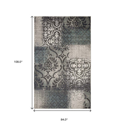 7' X 9' Teal And Ivory Damask Distressed Area Rug