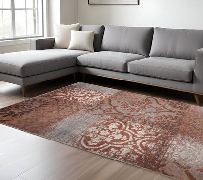 8' X 10' Rust And Gray Damask Distressed Area Rug