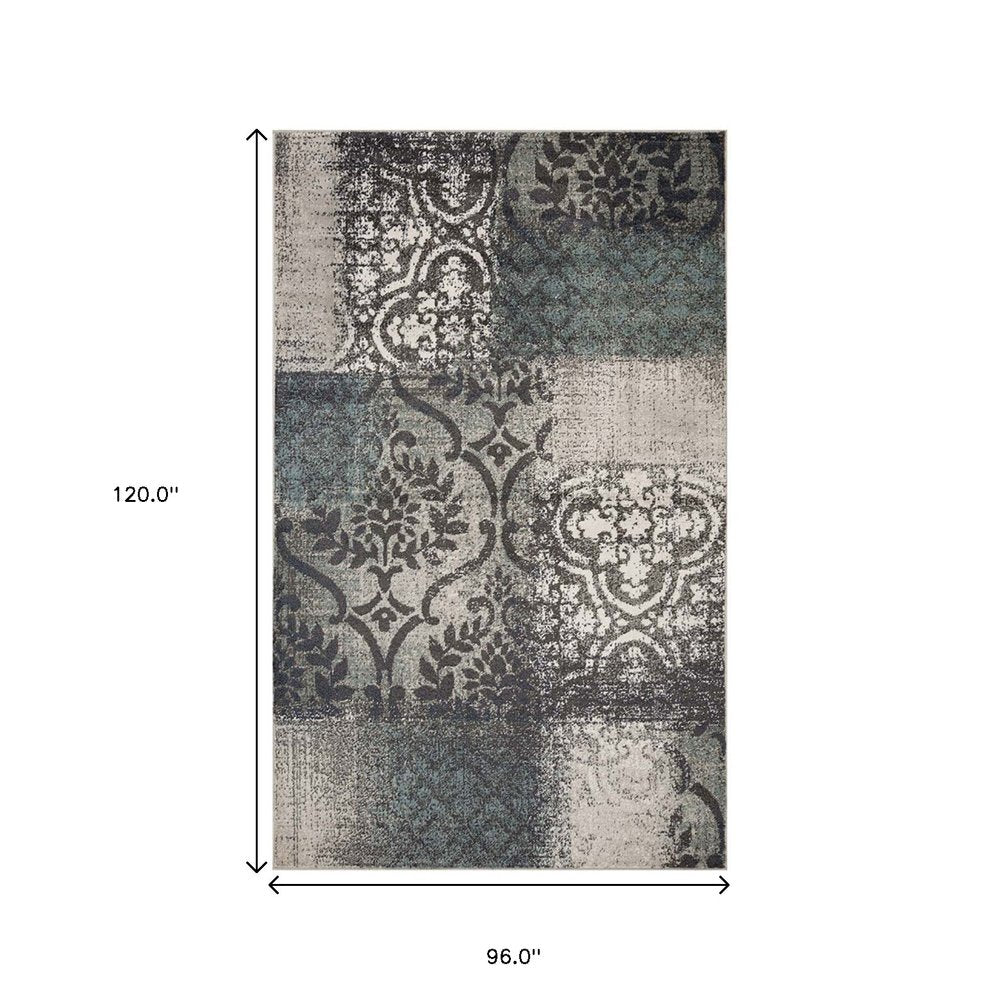 8' X 10' Teal And Ivory Damask Distressed Area Rug