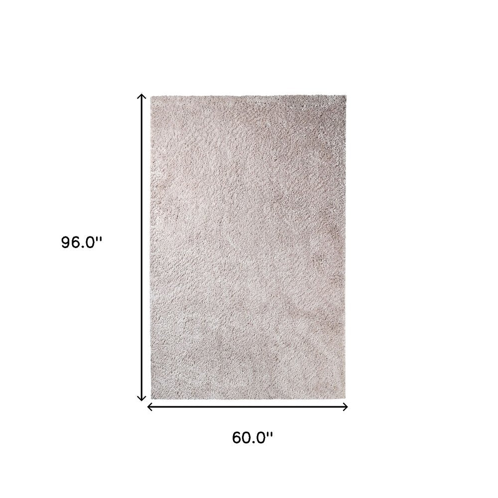 5' X 8' Beige Shag Handmade Area Rug