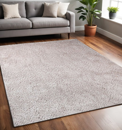 5' X 8' Beige Shag Handmade Area Rug