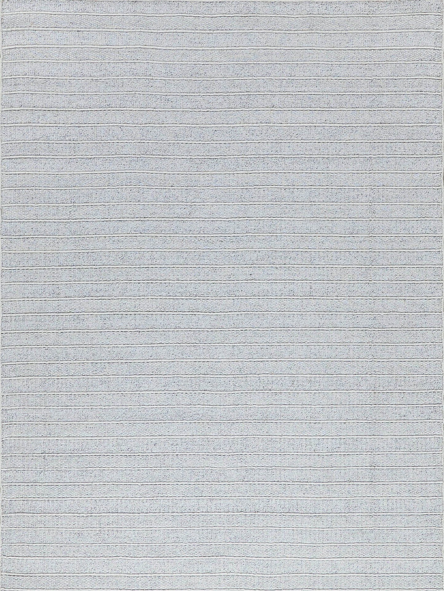 Light gray woven rug with subtle horizontal stripes and soft, textured surface.