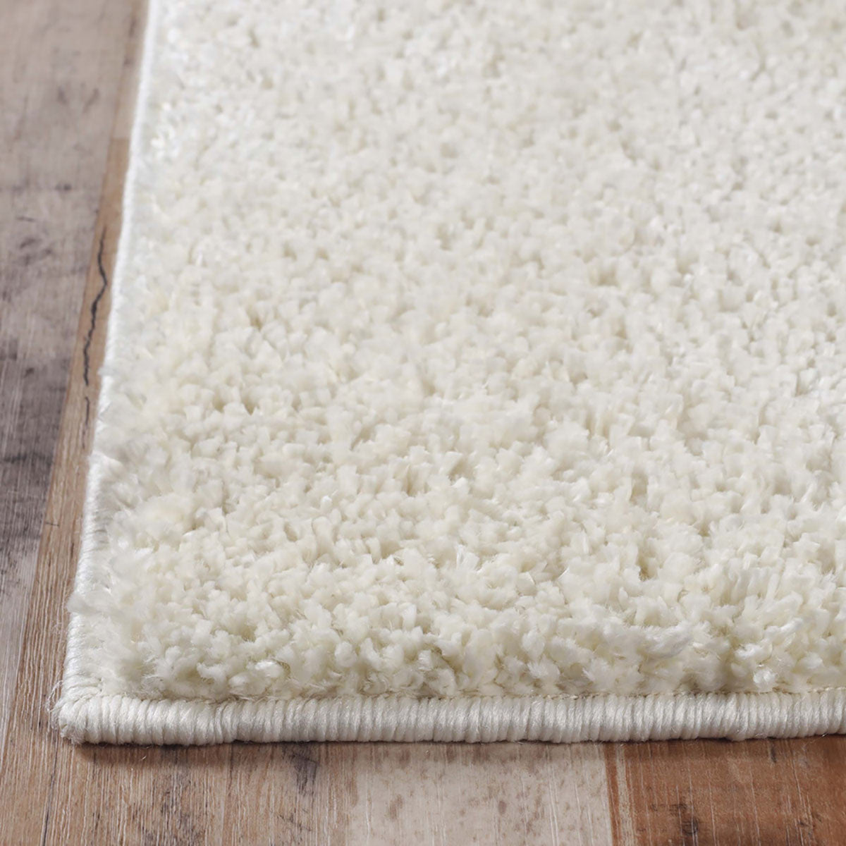 8' X 10' Ivory Shag Stain Resistant Area Rug